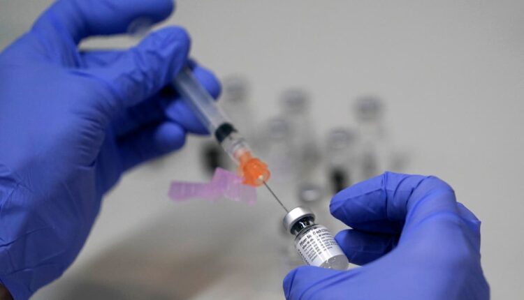 The Latest: Sources: US to recommend vaccine boosters