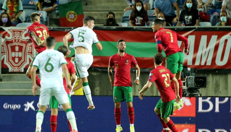 John Egan, number five, leads the Republic of Ireland in Portugal