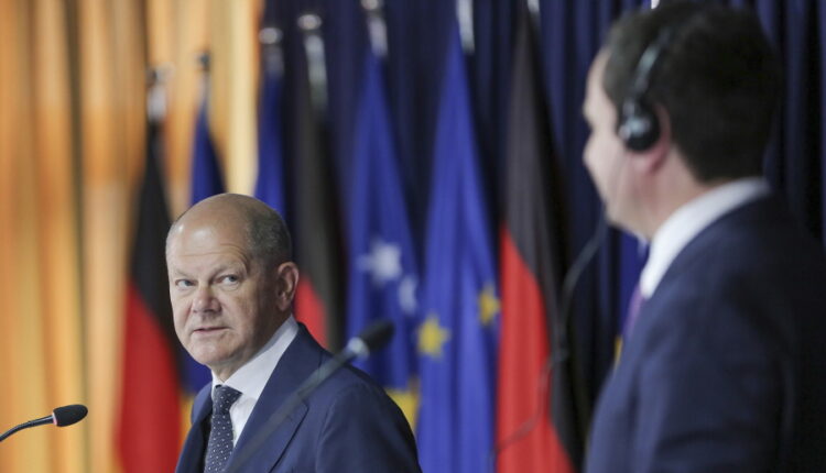 German Chancellor Olaf Scholz, left, and Kosovo Prime Minister Albin Kurti attend a joint press conference in Kosovo capital Pristina on Friday, June 10, 2022. Scholz is on a one day visit to the country.