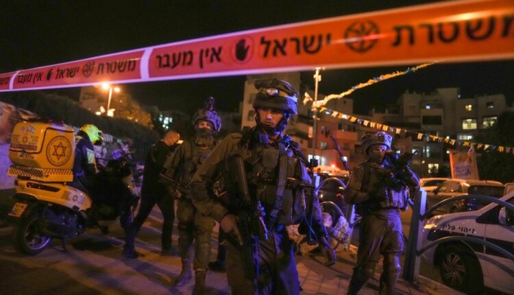 Israeli forces secure the area of a stabbing attack in the town of Elad, Israel, Thursday, May 5, 2022. (AP Photo/Maya Alleruzzo)